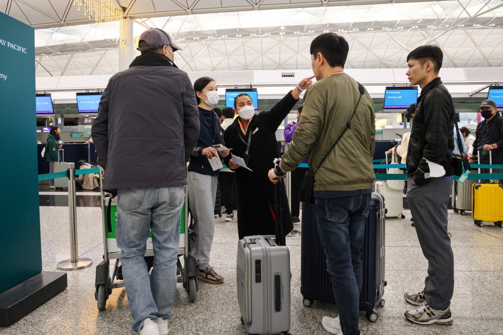 Passengers seek help at Cathay’s counter at Hong Kong airport on Thursday. Photo: Jelly Tse