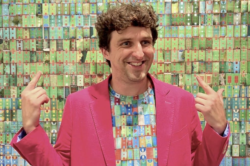 Photographer Austin Bell at the opening night of his exhibition, Shooting Hoops. Photo: Courtesy of Austin Bell