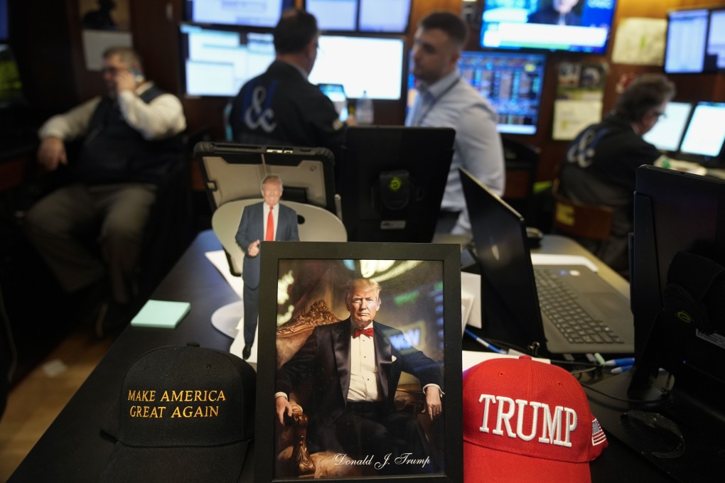 Paraphernalia supporting President Donald Trump is displayed at a post on the floor of the New York Stock Exchange on January 21, 2025. Photo: AP