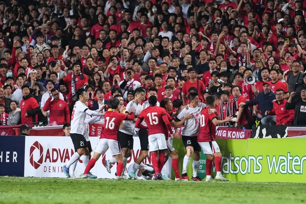 Players clash during the Guangdong-Hong Kong Cup second leg on Wednesday. Photo: Elson Li