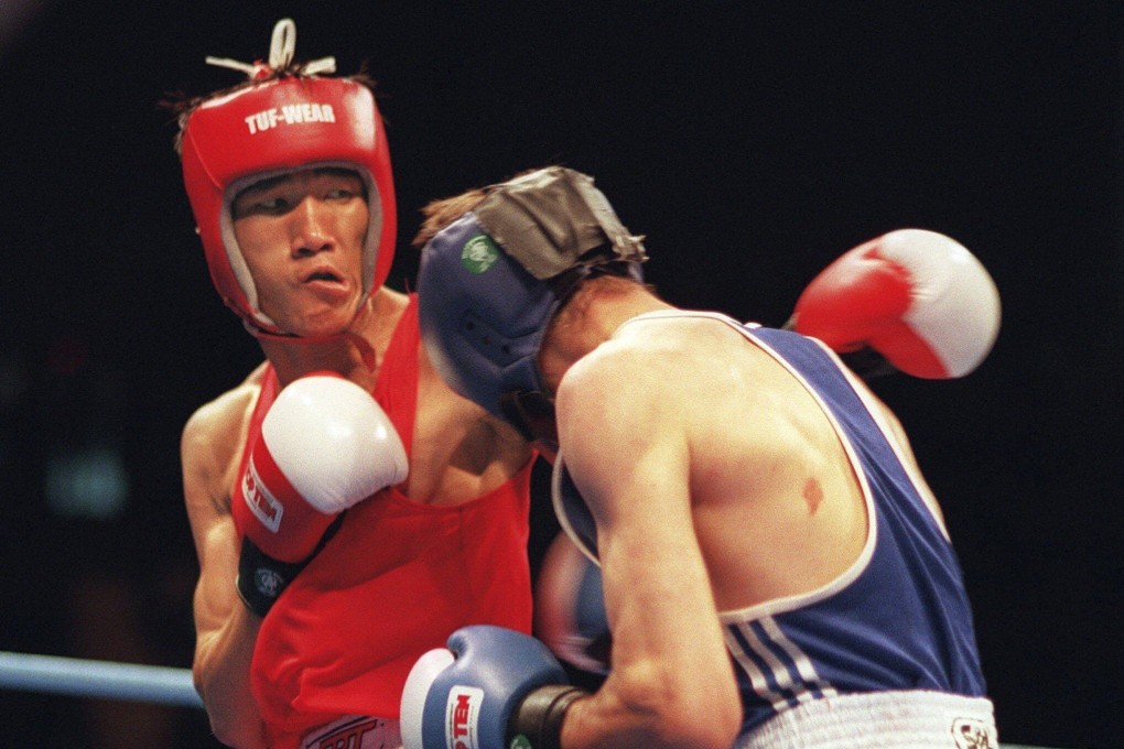 FILE - Thailand’s Somluck Kamsing (left) won gold at the Atlanta Games in 1996. Photo: AP