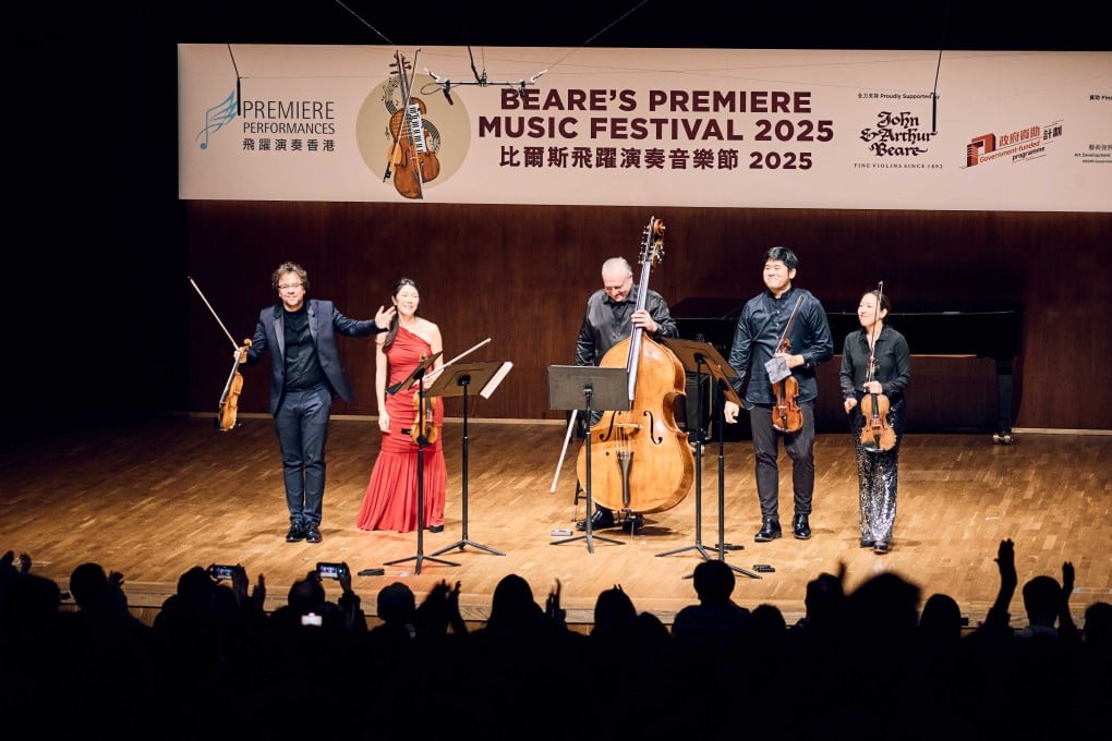 Violinists (from left) Alexander Sitkovetsky, So-Ock Kim, Jonathan Ong and Dorothy Ro and (centre) double bass player George Lomdaridze receive applause during the January 22, 2025 concert “La Belle Époque”, the finale of the 2025 Beare’s Premiere Music Festival, at Hong Kong City Hall. Photo: Kenny Cheung/Premiere Performances of Hong Kong