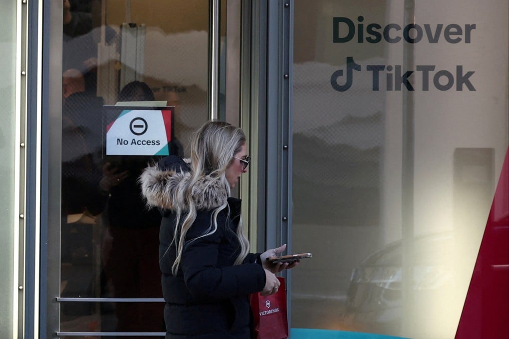 A TikTok logo is displayed at the entrance of the company’s temporary stand ahead of the World Economic Forum in Davos, Switzerland January 18, 2025. Photo: Reuters