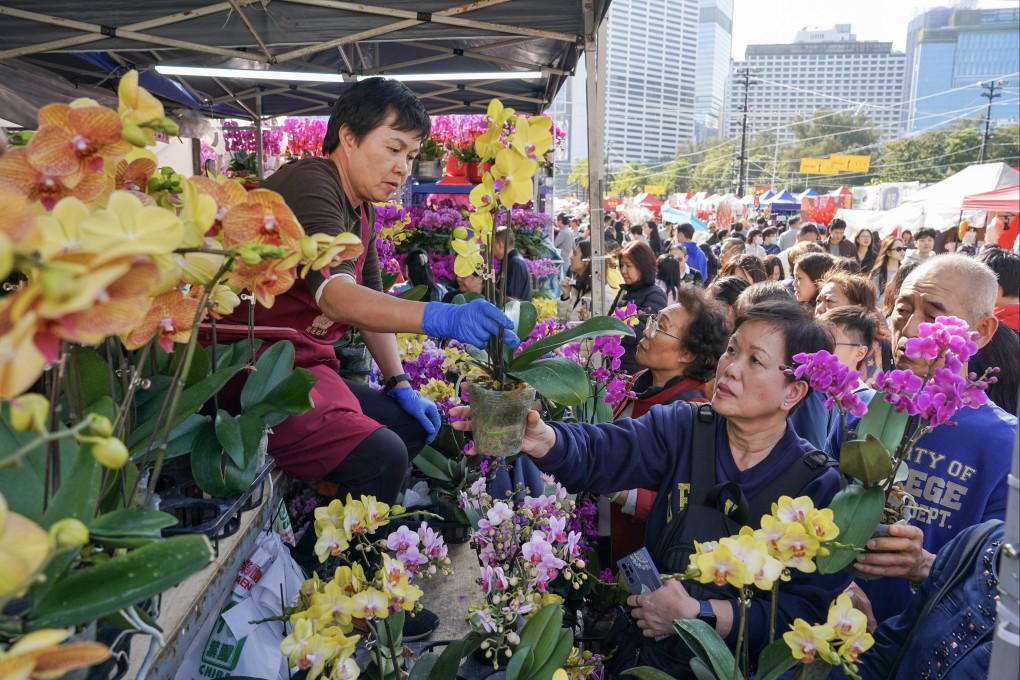 Shoppers at the Lunar New Year flower market in Victoria Park. Photo: Elson Li