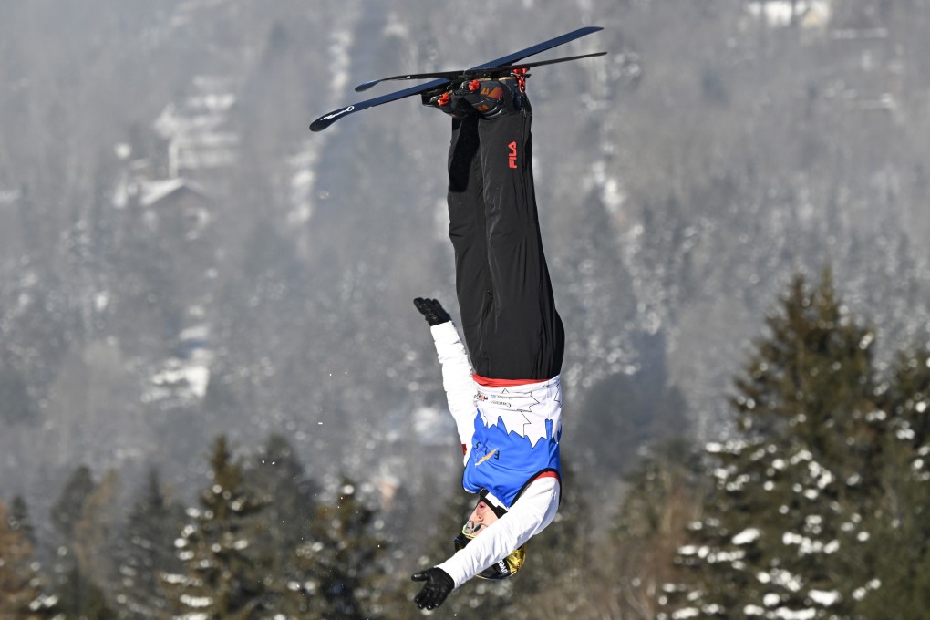 Qi Guangpu of China competes in the World Cup aerials event in Lac-Beauport. Photo: AP