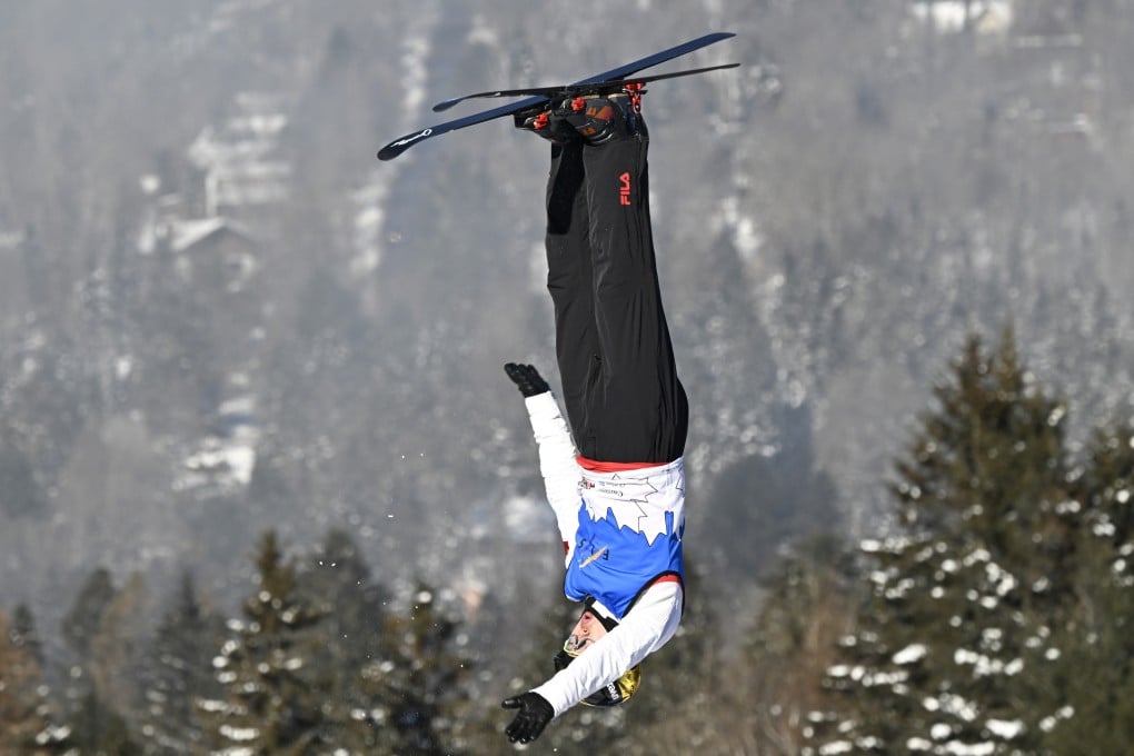 Qi Guangpu of China competes in the World Cup aerials event in Lac-Beauport. Photo: AP