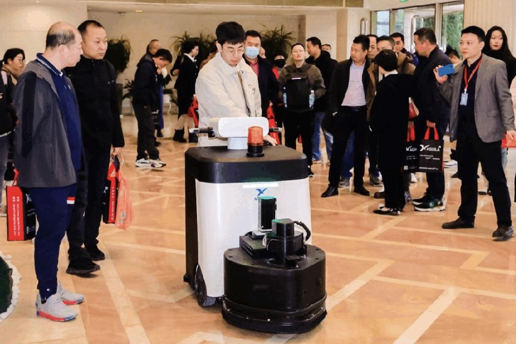 Suzhou Intelligence Technology’s commercial-grade cleaning robot shown at an event. Photo: Suzhou Intelligence Technology