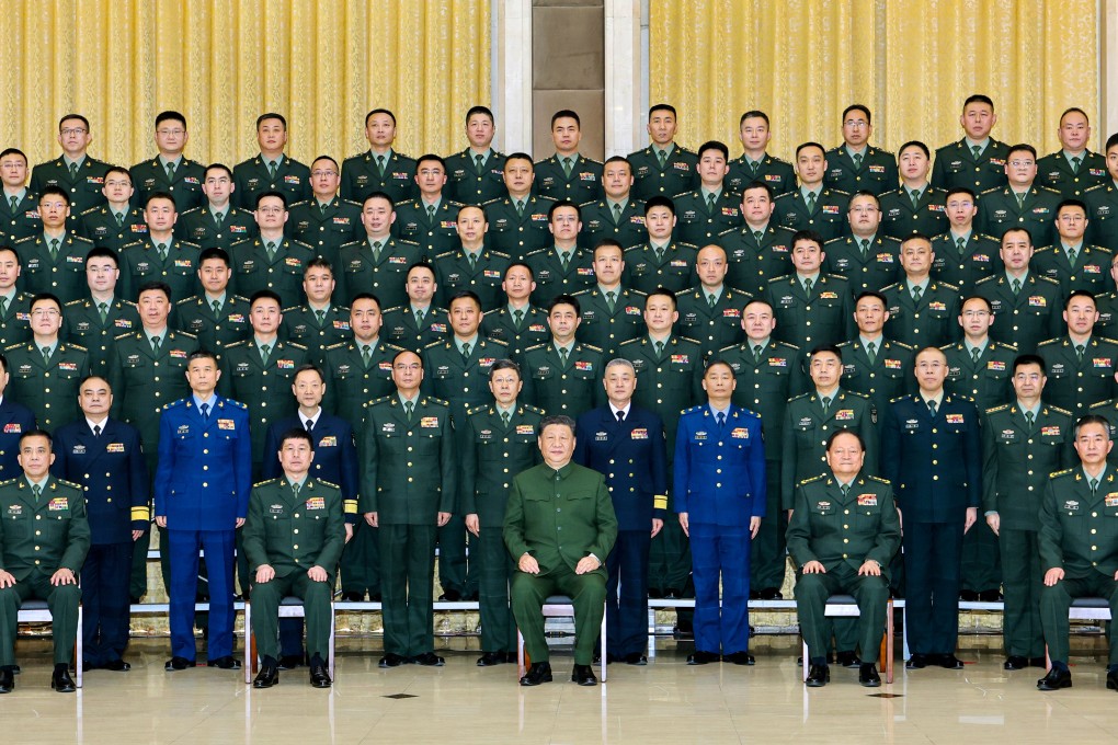 Chinese President Xi Jinping (front, centre) poses with officers and soldiers of the PLA’s Northern Theatre Command on Friday. Photo: Xinhua