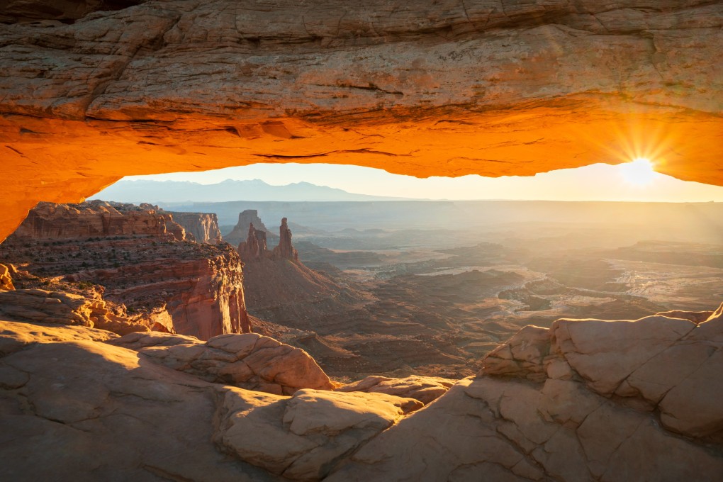 Mesa Arch at sunrise in Canyonlands National Park, one of the “Mighty 5” national parks in the US state of Utah, the others being the Arches, Bryce Canyon, Capitol Reef and Zion parks. Photo: Shutterstock