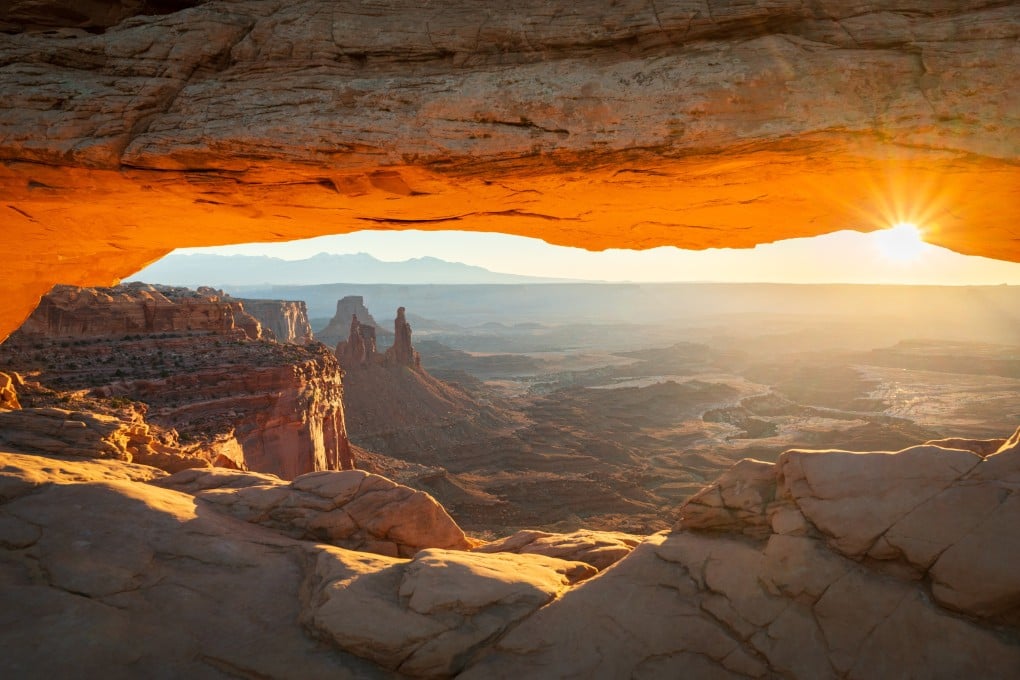 Mesa Arch at sunrise in Canyonlands National Park, one of the “Mighty 5” national parks in the US state of Utah, the others being the Arches, Bryce Canyon, Capitol Reef and Zion parks. Photo: Shutterstock