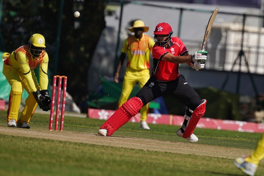 Nizakat Khan (in red) stars with the bat for Hong Kong against Uganda on Tuesday. Photo: Elson Li