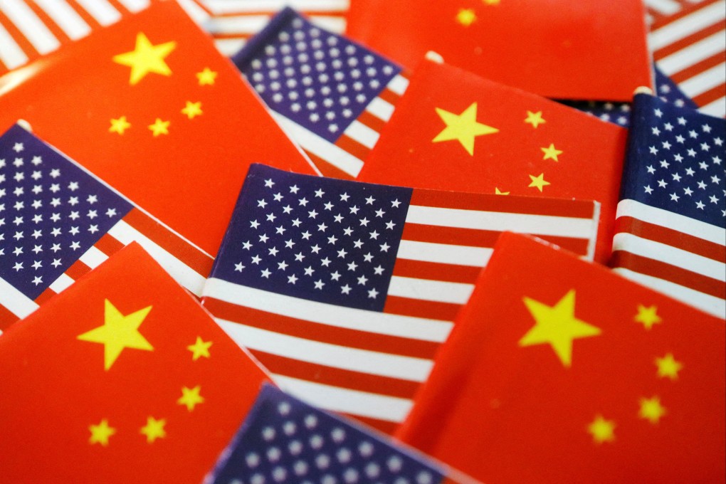 The flags of the US and China. China said on Monday it is willing to repatriate “confirmed” Chinese nationals from the US. Photo: Reuters
