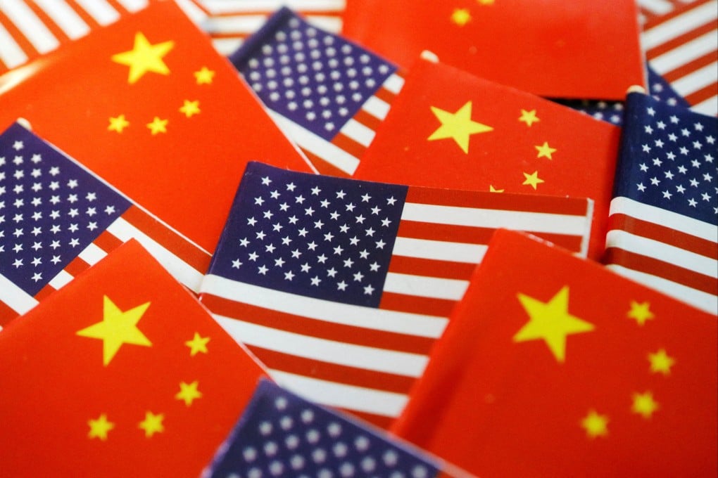 The flags of the US and China. China said on Monday it is willing to repatriate “confirmed” Chinese nationals from the US. Photo: Reuters