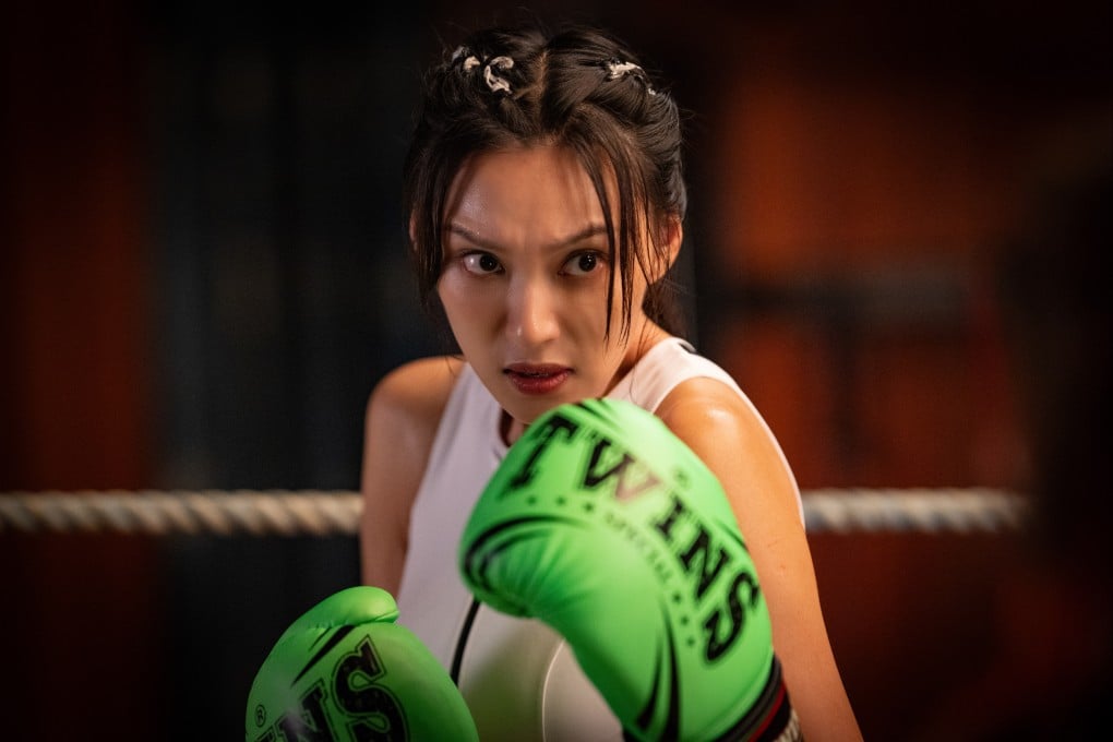 Louise Wong as high-flying advertising executive Elsa, who challenges her boyfriend’s boxer squeeze to a fight, in a still from Hit N Fun. Gigi Leung and Louis Koo co-star. Albert Mak directs.