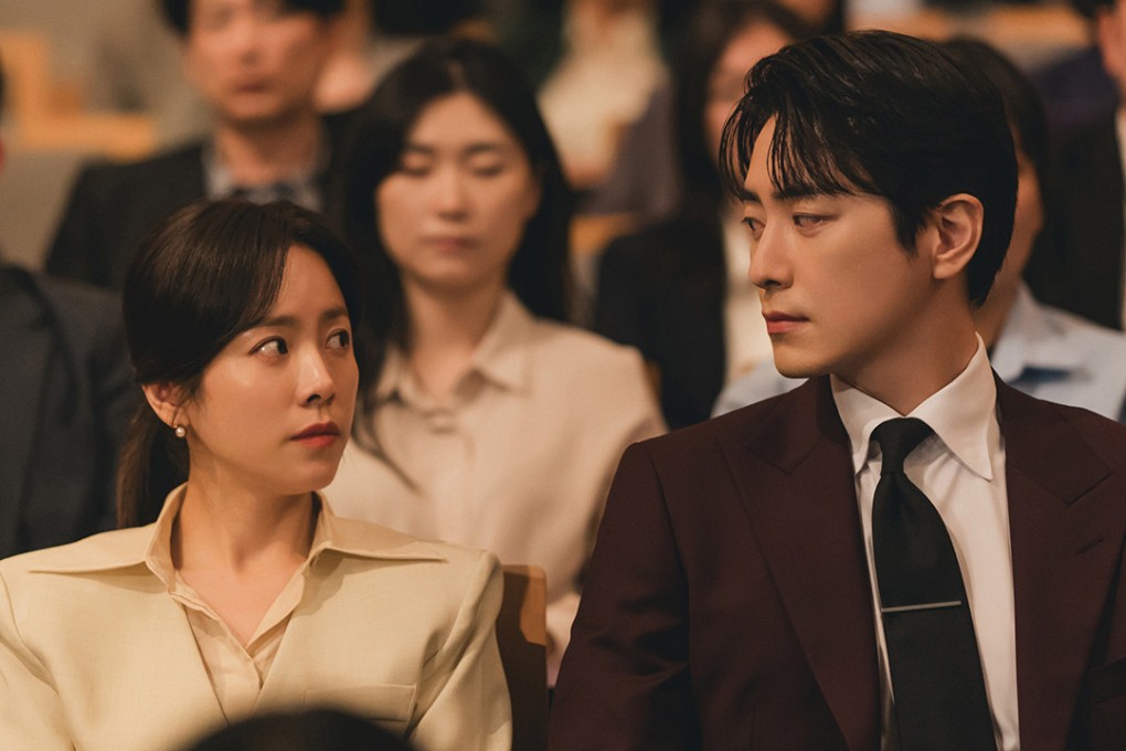 Han Ji-min (left) as headhunter Kang Ji-yoon and Lee Joon-hyuk as her personal secretary Yu Eun-ho in a still from Netflix K-drama romcom Love Scout.