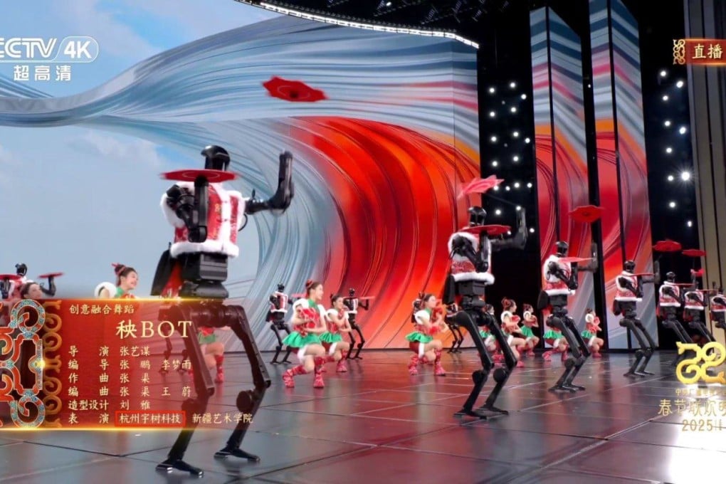 Robots share the stage with human dancers during CCTV’s Lunar New Year gala performance on Tuesday. Photo: Unitree