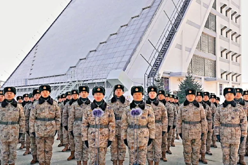 PLA Aerospace Force members, with the ground-based phased-array radar station in the background, in the video sent to Xi Jinping. Photo: Handout