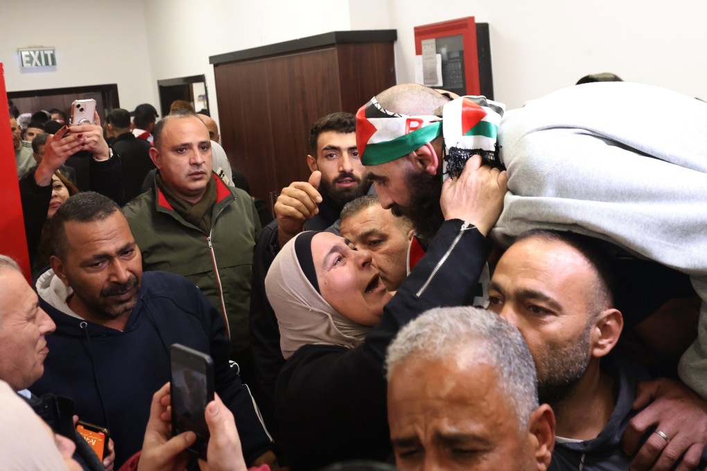 A Palestinian former detainee is greeted by family and friends as he arrives in Ramallah on Thursday. Photo: EPA-EFE