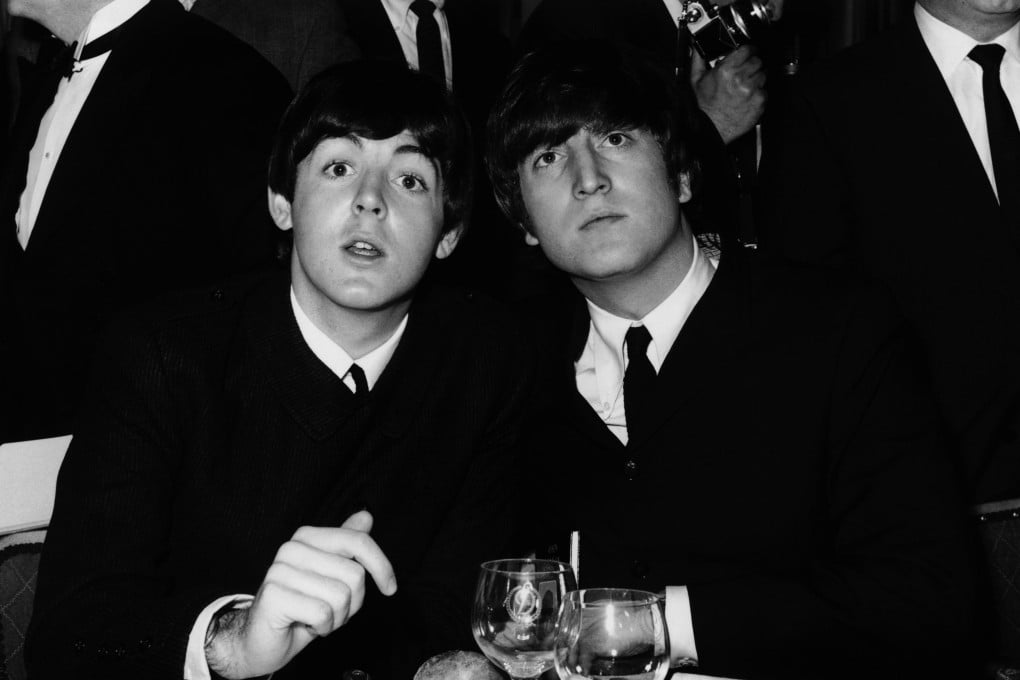 Paul McCartney (left) and John Lennon of the Beatles in 1964. A new record from the Beatles, produced with the help of AI, could win a Grammy this year. Photo: Getty Images