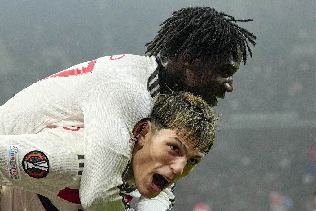 Manchester United’s Kobbie Mainoo celebrates with Alejandro Garnacho after scoring his side’s second against FCSB at the National Arena stadium. Photo: AP