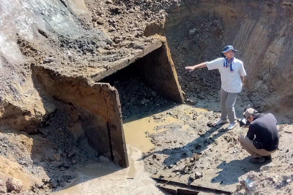 Researchers study the entrance to Chosei mine. Photo: Association to Engrave the Flooding Disaster of Chosei Coal Mine into History