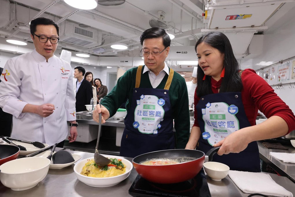 Chief Executive John Lee Ka-chiu assists with cooking at the Hung Hom community living room. Photo: Facebook / John KC Lee