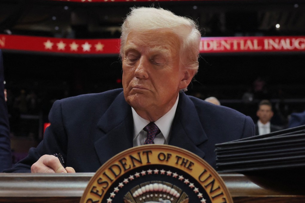 US President Donald Trump signs an executive order. Photo: Reuters