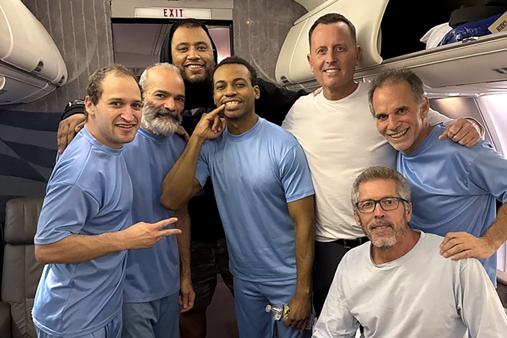 An X post by Richard Grenell, US President Donald Trump’s envoy, shows him (third from right) posing alongside six US citizens released from detention in Venezuela. Photo: AFP