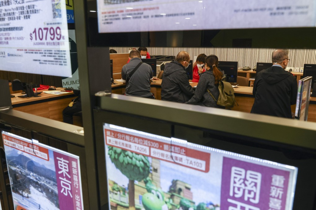 People visit a travel agency in Mong Kok. Demand for travel has continued to grow since the end of the Covid-19 pandemic. Photo: Dickson Lee