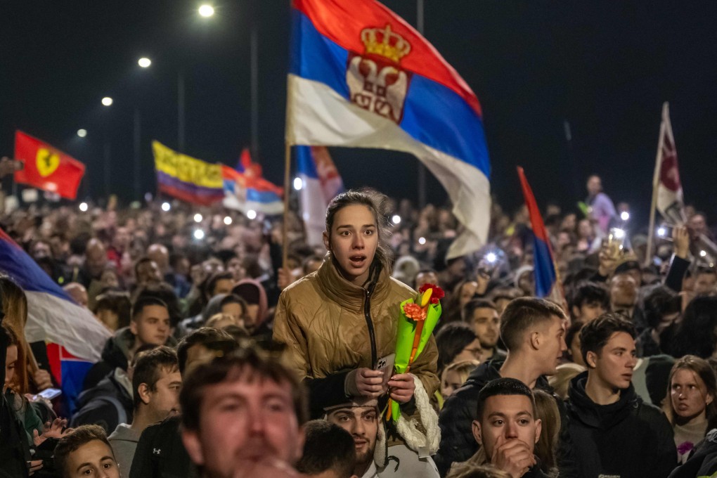 Demonstrators join a march for justice from Belgrade to Novi Sad organized by students, as they arrive in Novi Sad on Friday. Photo: AFP