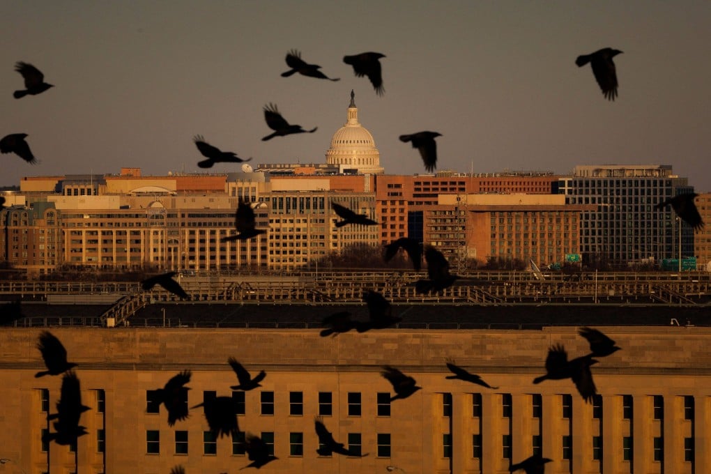 Birds fly near the Pentagon building in Arlington, Virginia, in December. Photo: AFP