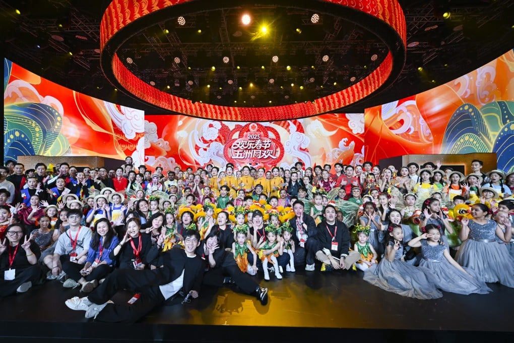 Performers and staff pose for a group photo after a Lunar New Year ceremony and gala in Malaysia’s Kuala Lumpur last month. Photo: Xinhua