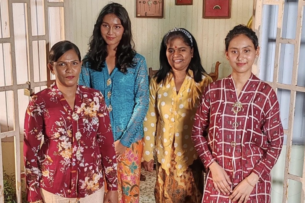 A group of women wearing traditional kebaya outfits in Melaka, Malaysia. Photo: Cedric Tan