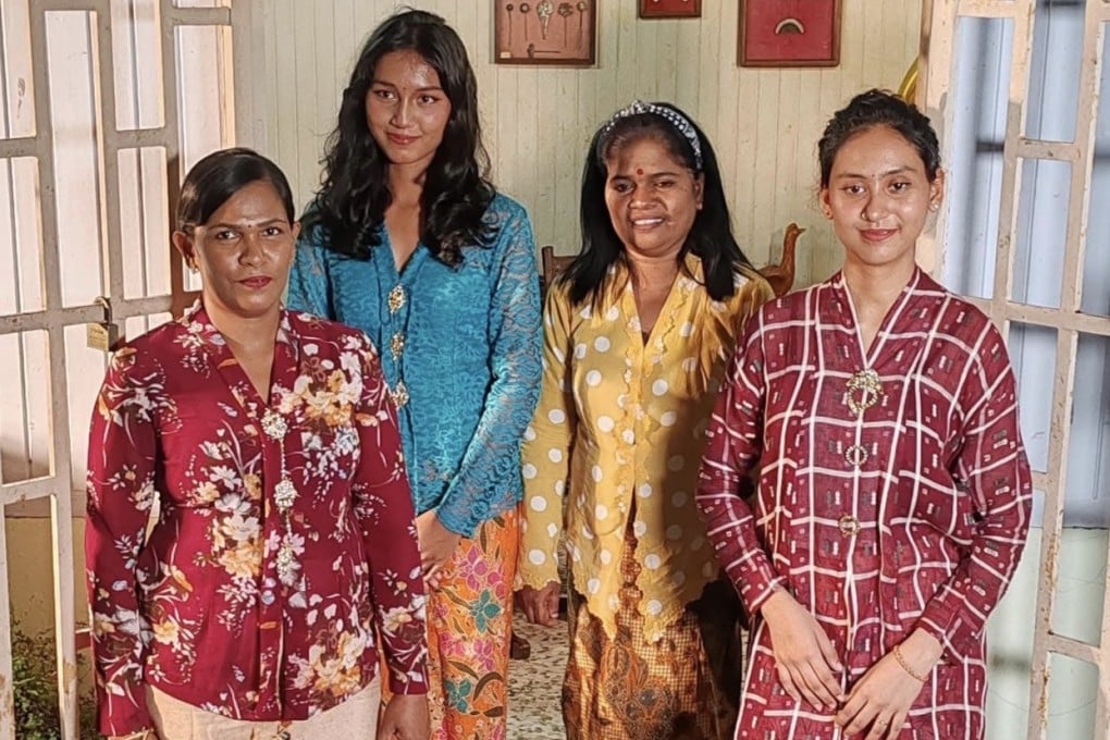 A group of women wearing traditional kebaya outfits in Melaka, Malaysia. Photo: Cedric Tan