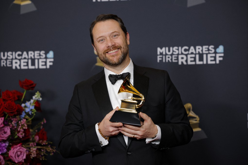 Jason Carter poses with the Best Audio Book, Narration and Storytelling Recording Grammy award he received on behalf of his grandfather, Jimmy Carter, in Los Angeles, California on Sunday. Photo: Reuters