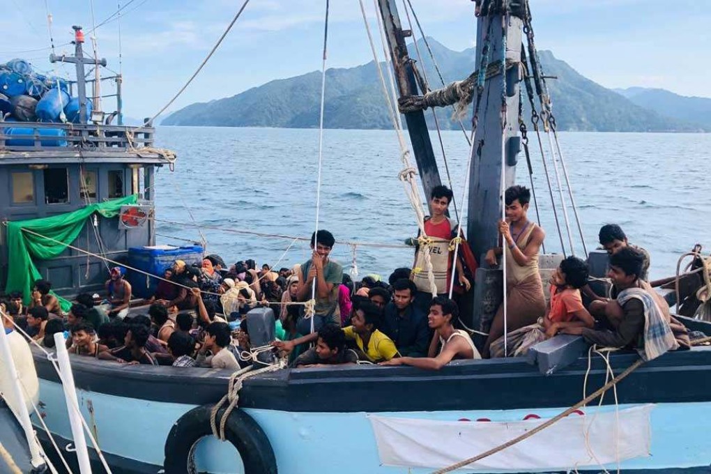A boat carrying suspected ethnic Rohingya migrants in Malaysian territorial waters. Photo: Reuters