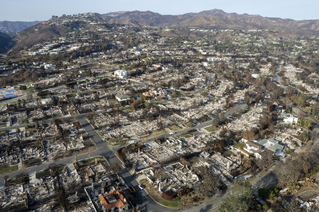 Buildings destroyed by fire in the Pacific Palisades neighbourhood of Los Angeles. Officials are trying to convince people visiting the city is still safe. Photo: Zuma Press Wire/dpa