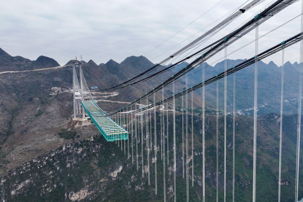 Construction of the Huajiang grand canyon bridge on November 30, 2024 in Guizhou, China. In 2023, the province’s Zunyi Road and Bridge Construction Group became China’s first LGFV to be forced to restructure its bank loans. Photo: VCG via Getty Images