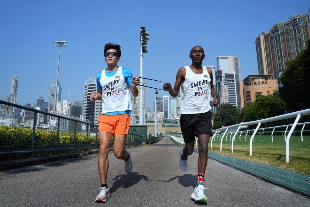 Lee Chun-fai and Lukas Wambua Muteti training on the track around Happy Valley racecourse. Photo: Elson Li