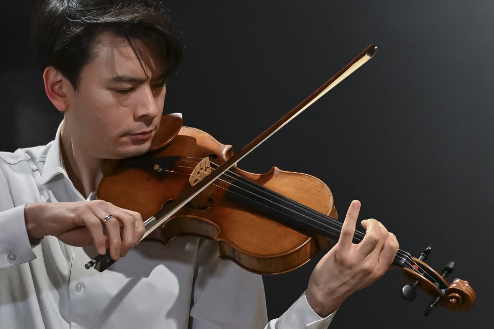 Classical US violinist Stefan Jackiw plays the Joachim-Ma Stradivarius violin during a preview of the instrument’s auction at Sotheby’s in New York on Monday. Photo: AFP