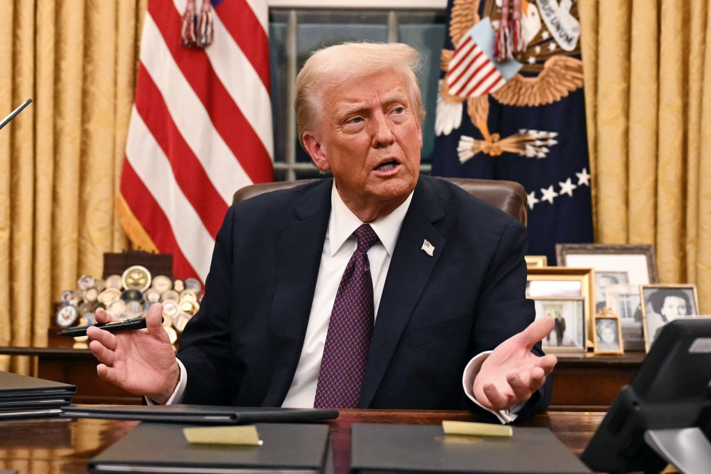 US President Donald Trump speaks to journalists about TikTok as he signs executive orders in the Oval Office of the White House on January 20. Photo: AFP/Getty Images/TNS