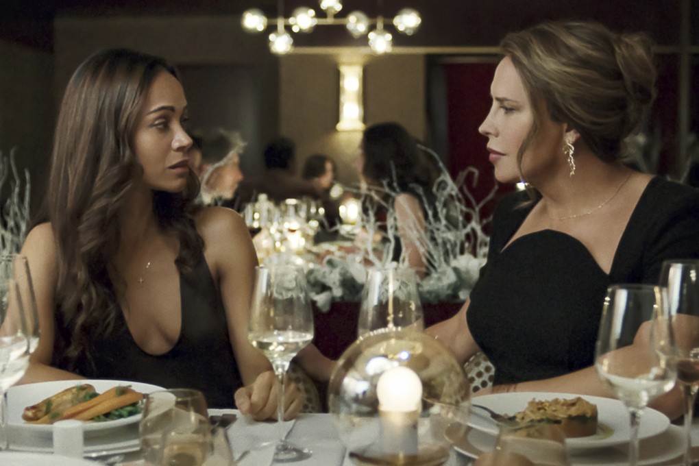 Karla Sofia Gascon, right, and Zoe Saldana in a scene from Emilia Perez. The film has met with criticism in Mexico for its use of non-Mexican actors, implausible story and being filmed in France. Photo: AP