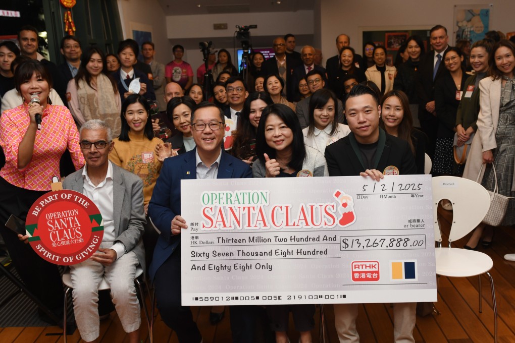 Kevin Huang (front row, second from left), the Post’s chief operating officer, and RTHK acting assistant director for radio Angel Cheng (front, second from right) with donors, beneficiaries and schools. Photo: SCMP
