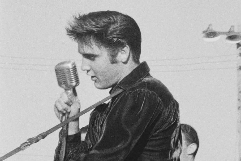 Elvis Presley, pictured on stage in Tupelo, Mississippi, in 1956, relied on the quality of the Shure Unidyne 55 microphone for performances so much that it became known as the Elvis Mic. Photo: Getty Images