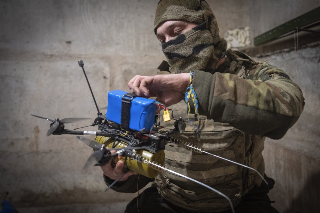 A Ukrainian soldier prepares a drone in the Donetsk region in 2024. Ukraine on Monday struck Russia with dozens of drones, triggering fires at a major oil refinery and gas processing plant. Photo: AP