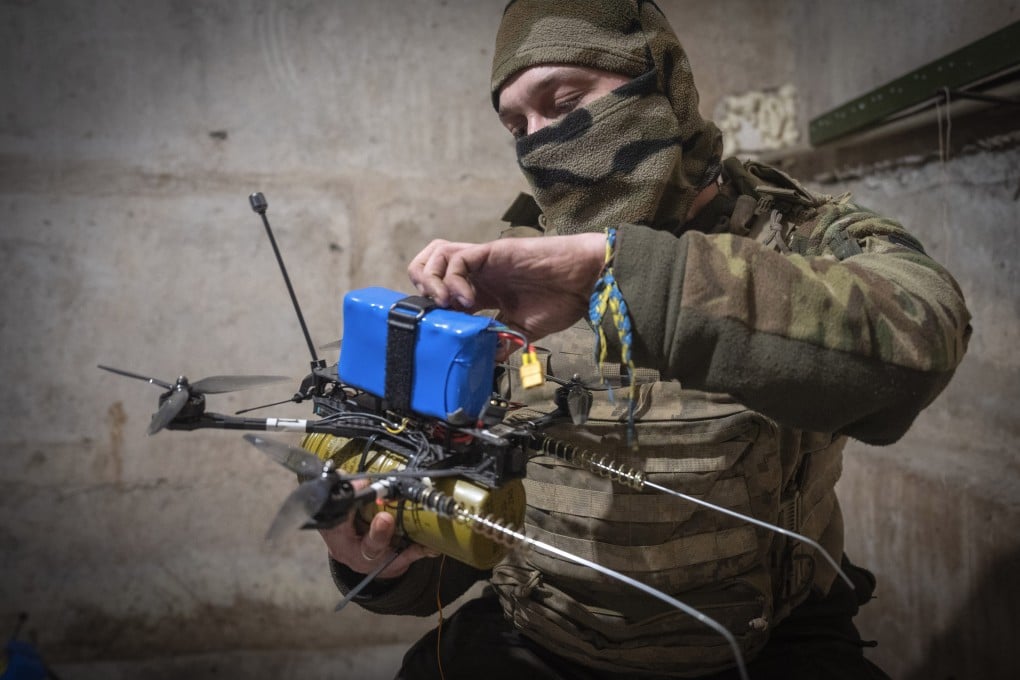 A Ukrainian soldier prepares a drone in the Donetsk region in 2024. Ukraine on Monday struck Russia with dozens of drones, triggering fires at a major oil refinery and gas processing plant. Photo: AP