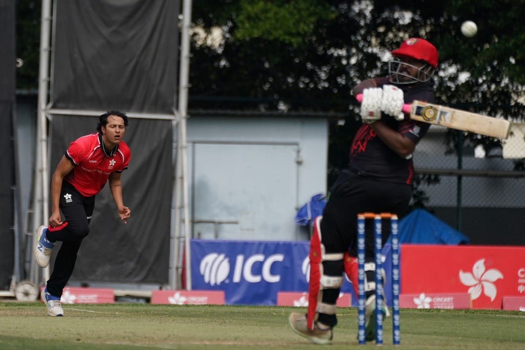 Ayush Shukla rushes a delivery past Thilipan Omaidurai during Singapore’s innings of 171. Photo: Elson Li