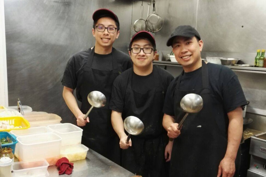 (From left) Writer Ginny Wong’s cousin, younger brother and uncle pose for a photo at her uncle’s takeaway in England in 2017. Photo: Courtesy of the Wong family