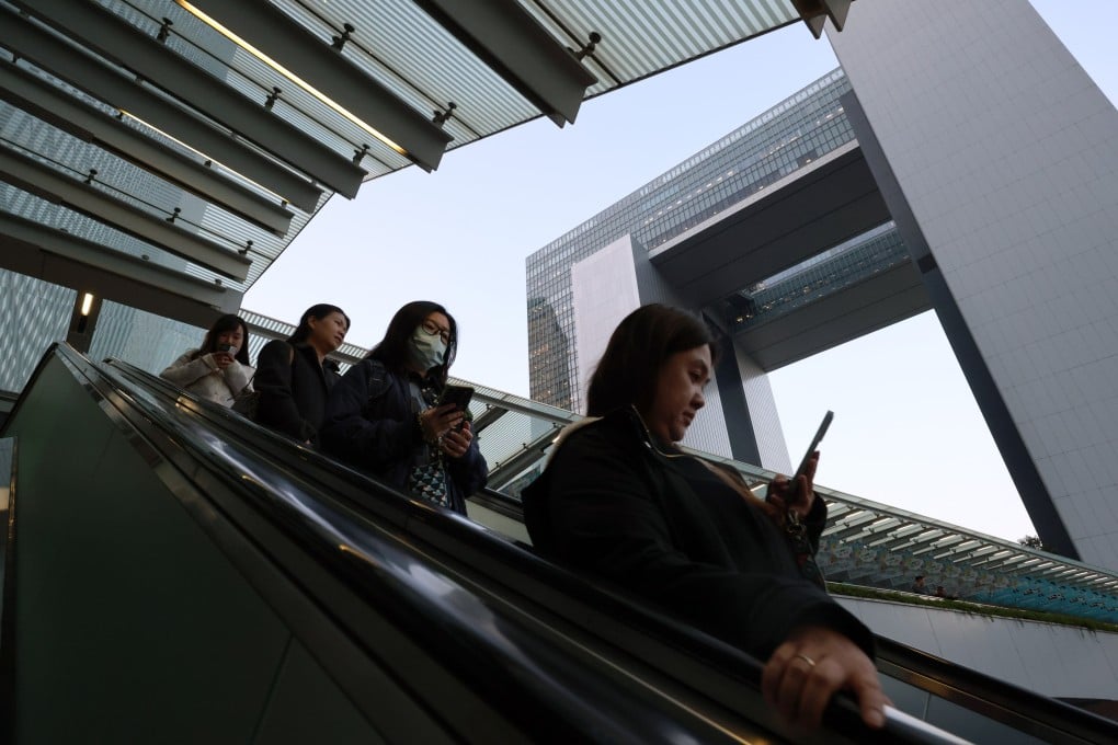 Civil servants at government headquarters at Tamar. Police groups and some legislators had pushed for laws during the social unrest that would ban insults against officers. Photo: Jelly Tse