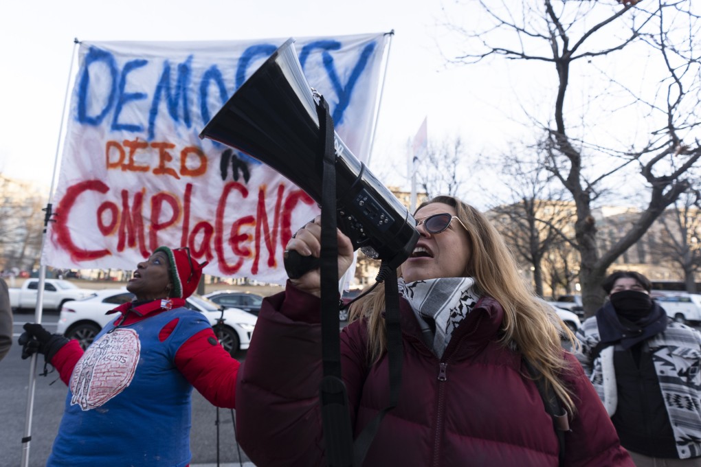 Protesters joins a rally in front of the Office of Personnel Management in Washington on Monday after US President Donald Trump revealed plans to reshape government. Photo: AP
